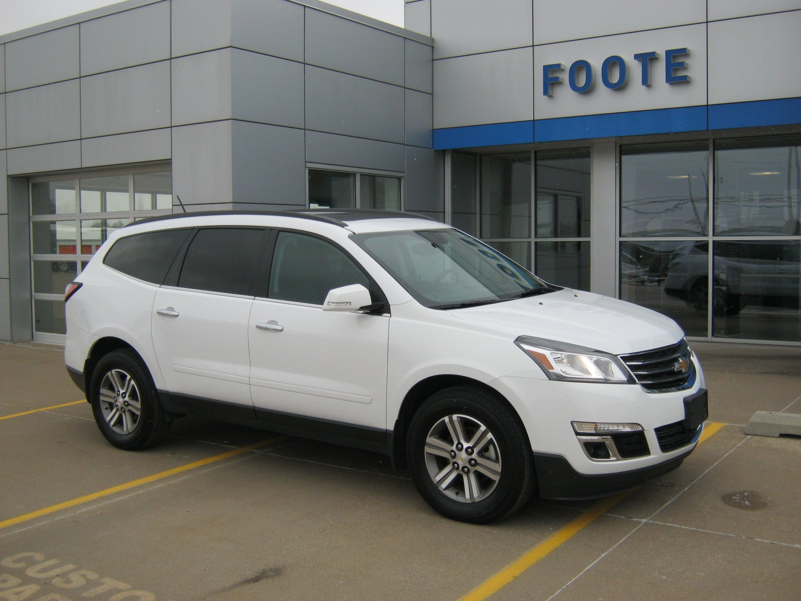 2017 Chevrolet Traverse LT in Summit White — front three-quarter view