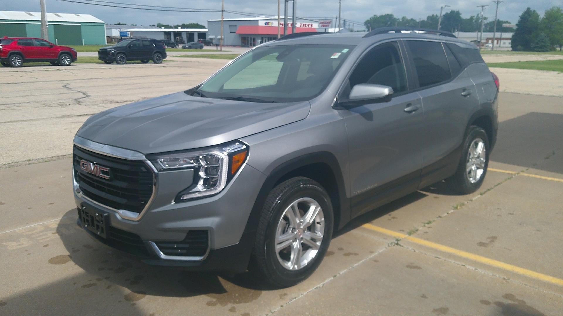 2024 GMC Terrain SLE in Sterling Metallic — front three-quarter view